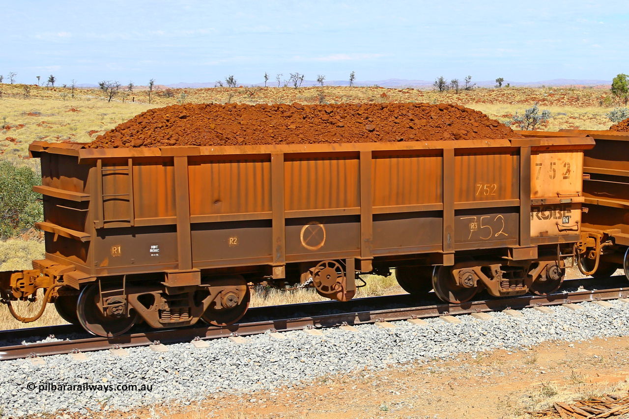 0752 170729 0203
Robe River ore waggon 752, built by Tomlinson Steel WA, fixed coupler handbrake side loaded view at the 103 km, between Maitland Siding and the Fortescue River on the Deepdale line. July 29, 2017.
Keywords: 752;Tomlinson-Steel-WA;Robe-ore-waggon;
