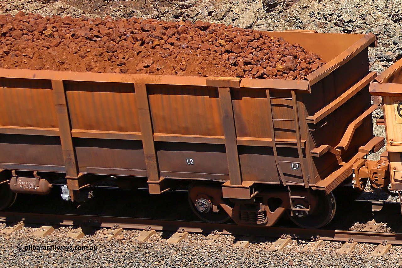 0754 160306 1657
Robe River ore waggon 754, built by Centurion Industries WA, fixed coupler non-handbrake side loaded partial view showing drop rib end, at the 45 km, Harding Siding on the Cape Lambert line. March 6, 2016.
Keywords: 754;Centurion-Industries-WA;Robe-ore-waggon;