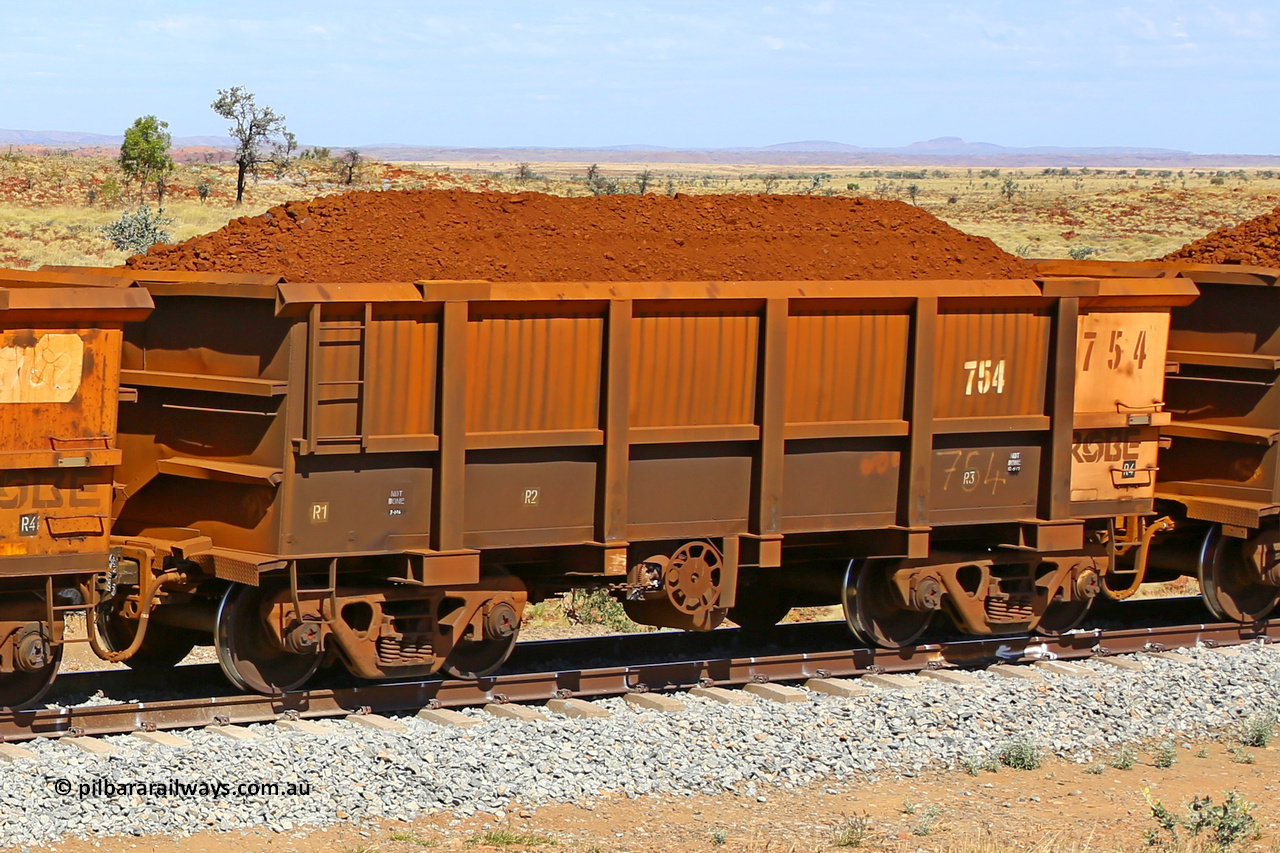 0754 170729 0243
Robe River ore waggon 754, built by Centurion Industries WA, fixed coupler handbrake side loaded view at the 103 km, between Maitland Siding and the Fortescue River on the Deepdale line. July 29, 2017.
Keywords: 754;Centurion-Industries-WA;Robe-ore-waggon;