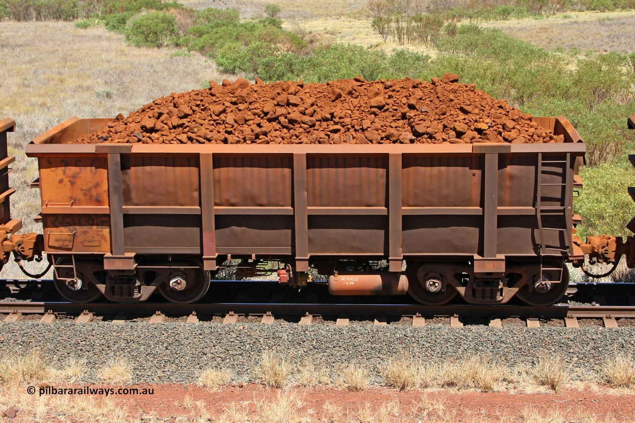 0756 081209 0141
Robe River ore waggon 756, built by Centurion Industries WA, non-handbrake side loaded view at the 7 km location just south of Cape Lambert yard. December 9, 2008.
Keywords: 756;Centurion-Industries-WA;Robe-ore-waggon;
