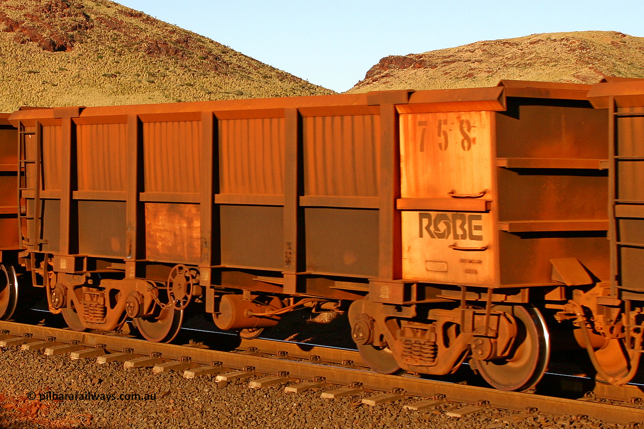 0758 060722 7633
Robe River ore waggon 758, built by Centurion Industries WA, rotary coupler end handbrake side empty partial view, at the 11.7 km, Cape Lambert. July 22, 2006.
Keywords: 758;Centurion-Industries-WA;Robe-ore-waggon;