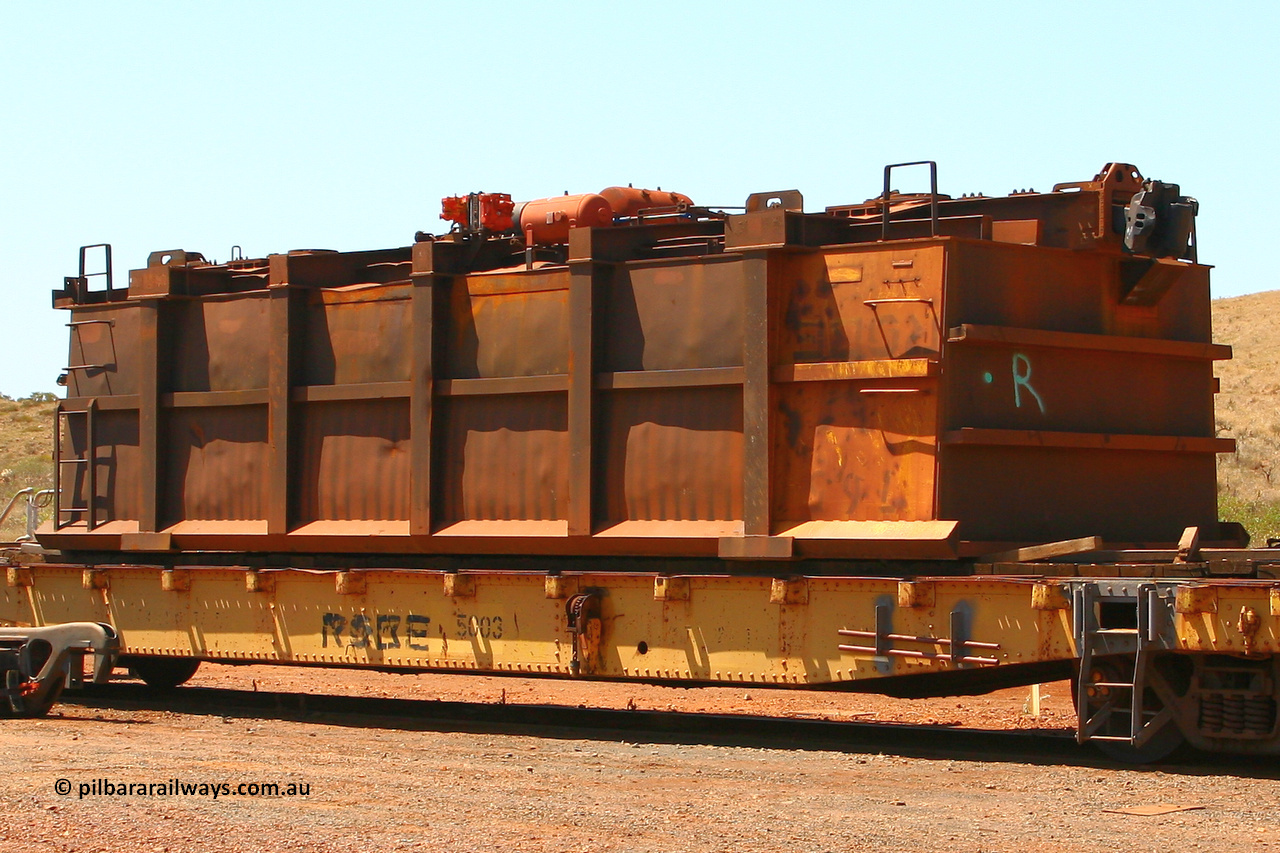 0765 070909 0666
Robe River ore waggon 765, built by Centurion Industries WA, rotary coupler end non-handbrake side upside down on flat waggon 5003, Cape Lambert. September 9, 2007.
Keywords: 765;Centurion-Industries-WA;Robe-ore-waggon;5003;Robe-flat-waggon;