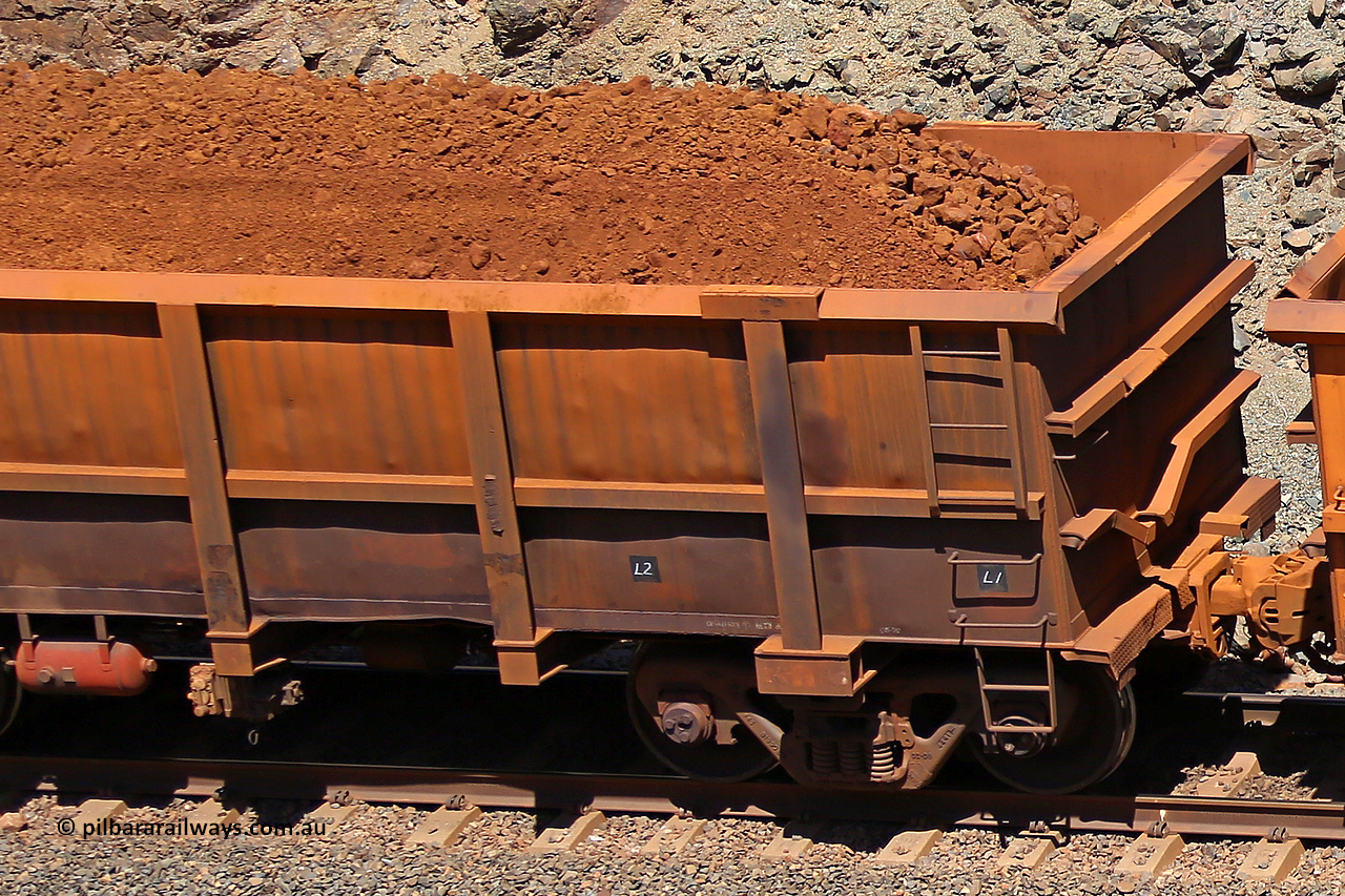 0765 160306 1606
Robe River ore waggon 765, built by Centurion Industries WA, fixed coupler non-handbrake side loaded view showing drop rib end, at the 45 km, Harding Siding on the Cape Lambert line. March 6, 2016.
Keywords: 765;Centurion-Industries-WA;Robe-ore-waggon;