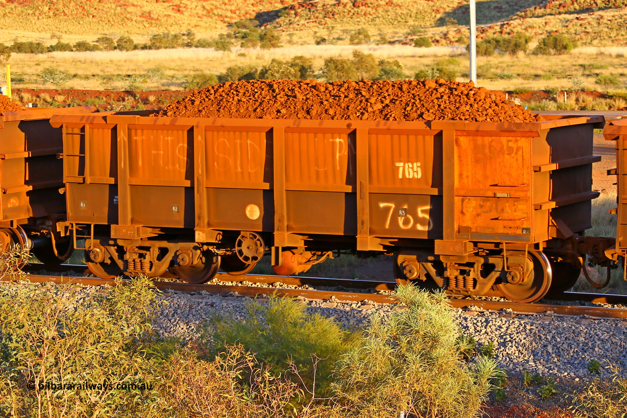 0765 170513 8629
Robe River ore waggon 765, built by Centurion industries WA, rotary coupler end handbrake side loaded view, word say THIS SIDE UP with arrows following a prior derailment, Cape Lambert yard, May 13, 2017.
Keywords: 765;Centurion-Industries-WA;Robe-ore-waggon;