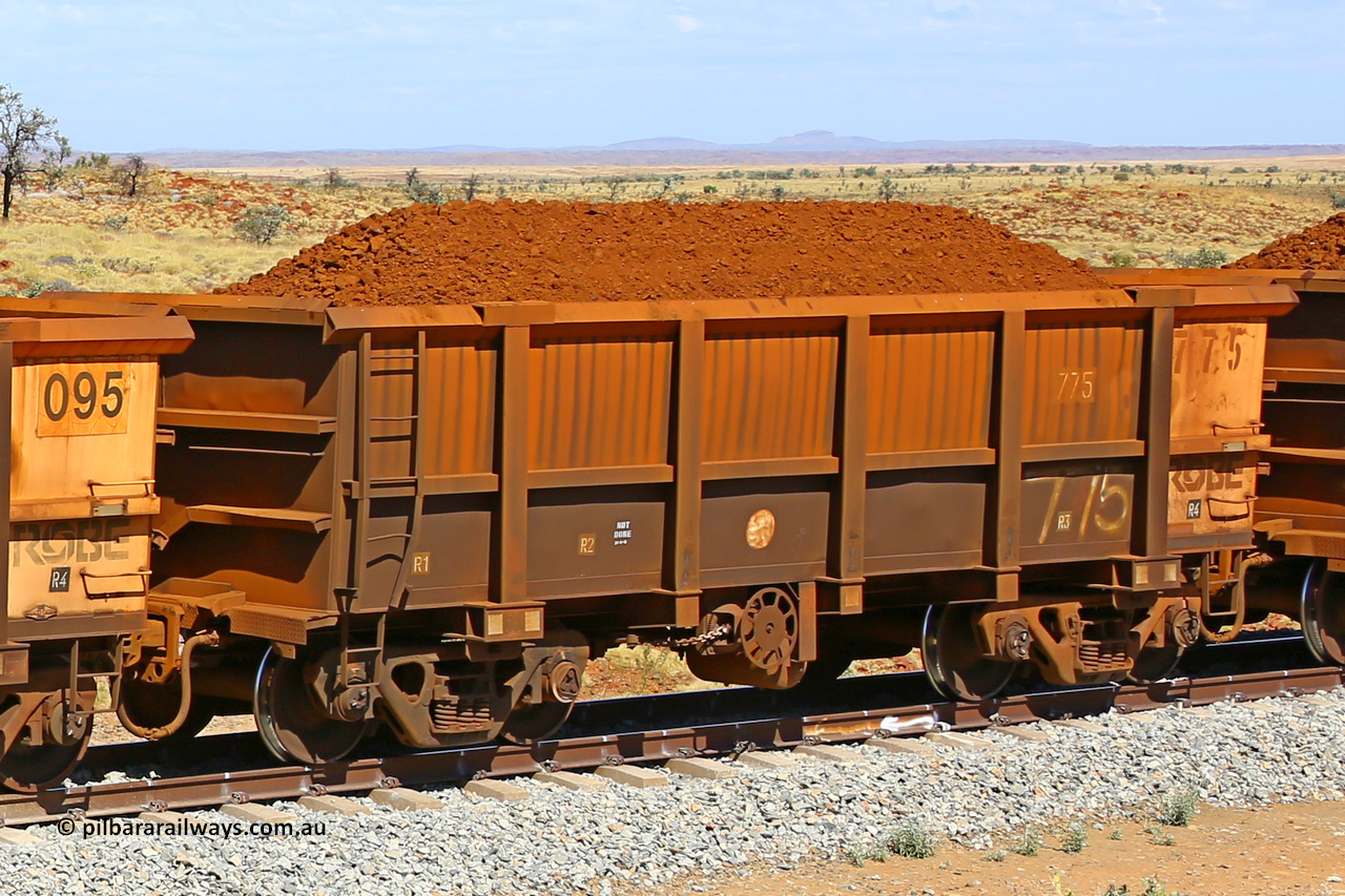 0775 170729 0223
Robe River ore waggon 775, built by Centurion Industries WA, fixed coupler handbrake side loaded view at the 103 km, between Maitland Siding and the Fortescue River on the Deepdale line. July 29, 2017.
Keywords: 775;Centurion-Industries-WA;Robe-ore-waggon;