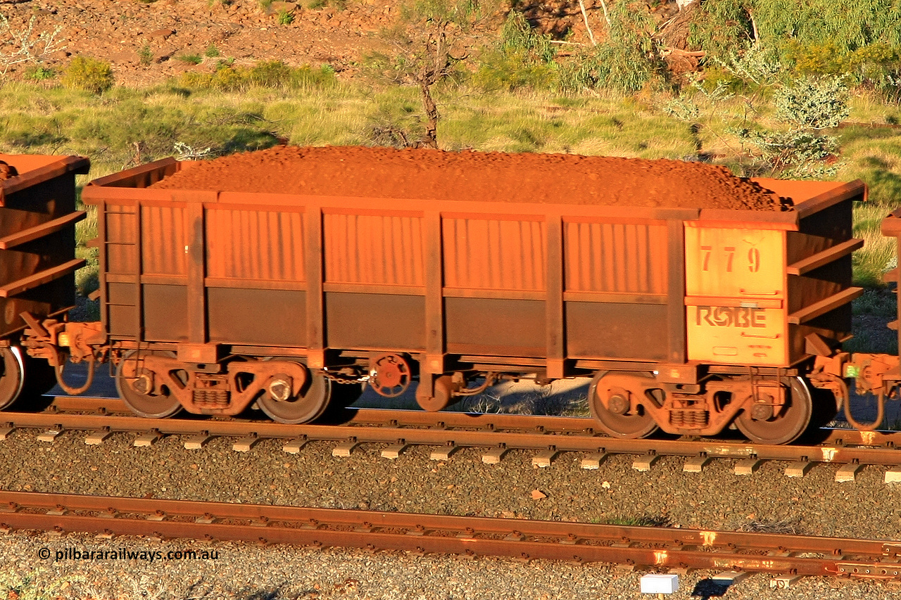 0779 110602 1650
Robe River ore waggon 779, built by Centurion Industries WA, rotary coupler end handbrake side loaded view at the 71 km, Western Creek on the Deepdale line. June 2, 2011.
Keywords: 779;Centurion-Industries-WA;Robe-ore-waggon;