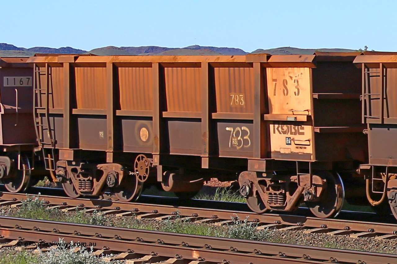 0783 160727 0961
Robe River ore waggon 783, built by Centurion Industries WA, rotary coupler end handbrake side empty view at Harding Siding on the Cape Lambert line, July 27, 2016.
Keywords: 783;Centurion-Industries-WA;Robe-ore-waggon;