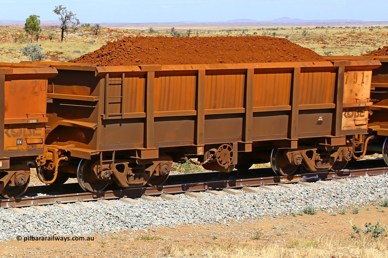 0791 170729 0231
Robe River ore waggon 791, built by Centurion Industries WA, fixed coupler non-handbrake side loaded view, shows drop rib detail, at the 45 km, Harding Siding on the Cape Lambert line. March 6, 2016.
Keywords: 791;Centurion-Industries-WA;Robe-ore-waggon;