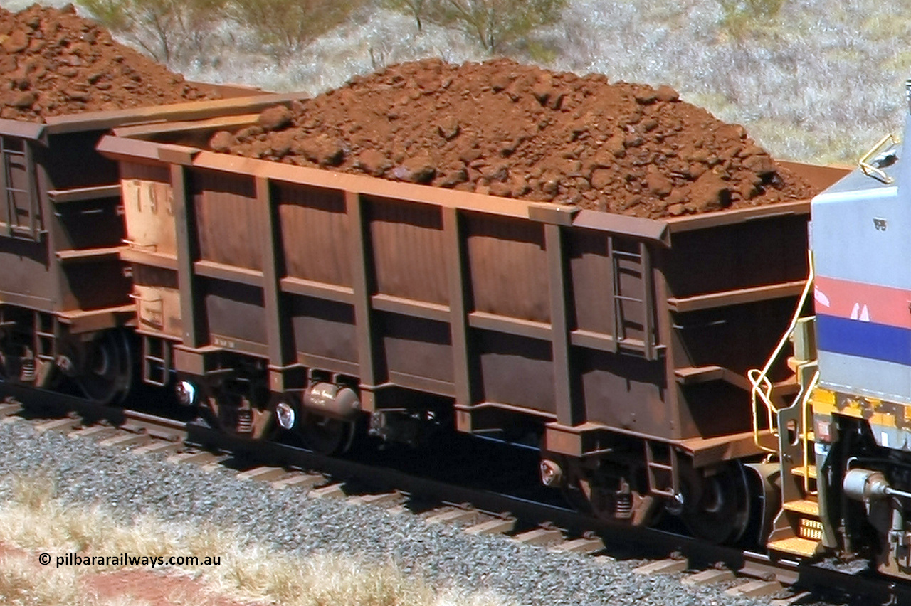 0795 081209 0107
Robe River ore waggon 795, built by Centurion Industries WA, fixed coupler non-handbrake side loaded view at the 7 km location just south of Cape Lambert yard. December 9, 2008.
Keywords: 795;Centurion-Industries-WA;Robe-ore-waggon;