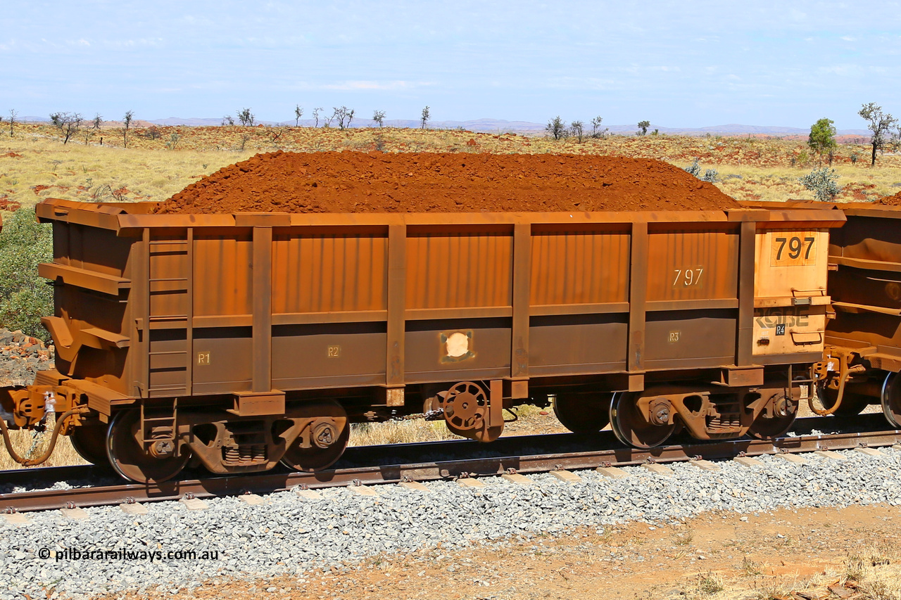 0797 170729 0242
Robe River ore waggon 797, built by Centurion Industries WA, fixed coupler handbrake side loaded view at the 103 km, between Maitland Siding and the Fortescue River on the Deepdale line. July 29, 2017.
Keywords: 797;Centurion-Industries-WA;Robe-ore-waggon;