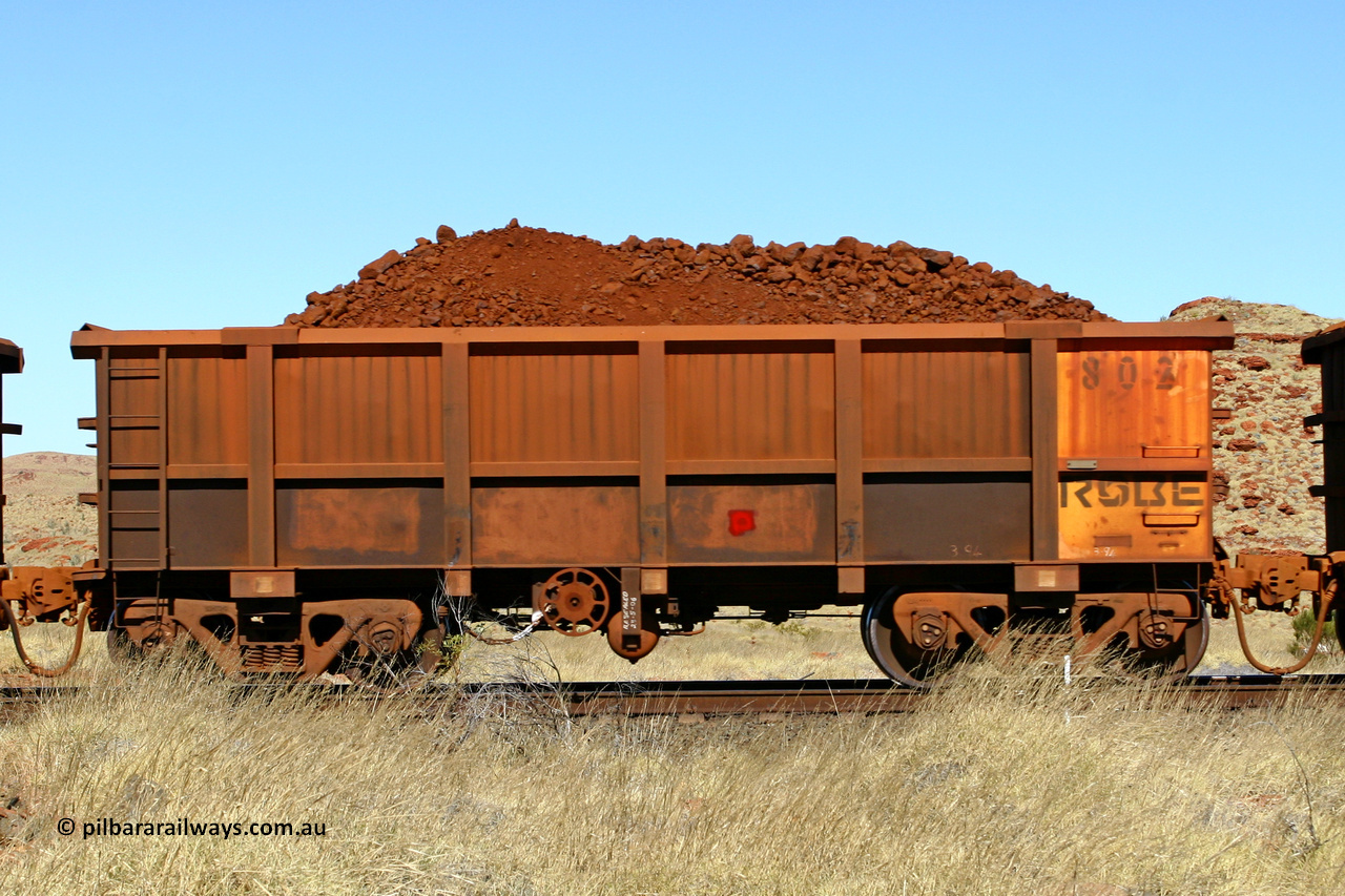 0802 060722 7516
Robe River ore waggon 802, built by Centurion Industries WA, handbrake side loaded view at the 78.8 km between Western Creek and Maitland on the Deepdale line. July 22, 2006.
Keywords: 802;Centurion-Industries-WA;Robe-ore-waggon;