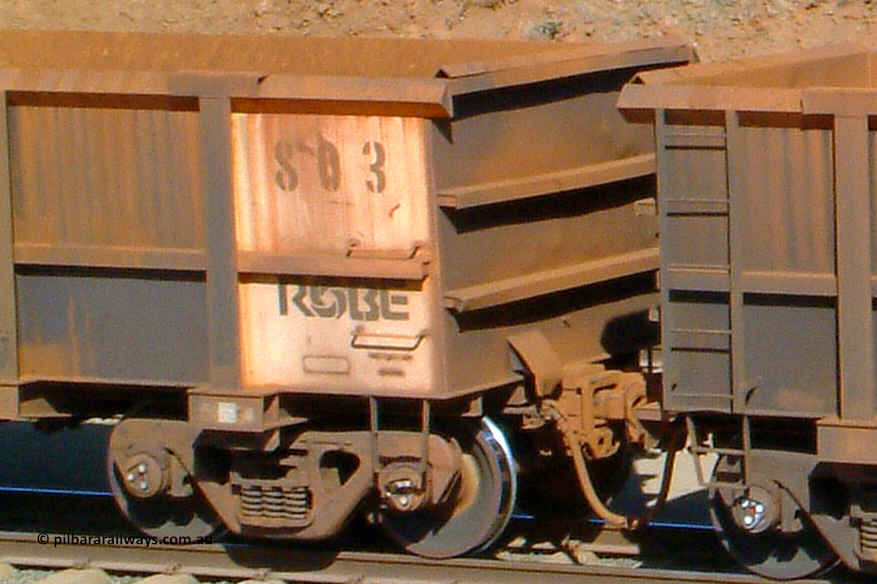 0803 041014 154200
Robe River ore waggon 803, built by Centurion Industries WA, rotary coupler end handbrake side empty view, Cape Lambert yard. 1542 hours, October 14, 2004.
Keywords: 803;Centurion-Industries-WA;Robe-ore-waggon;