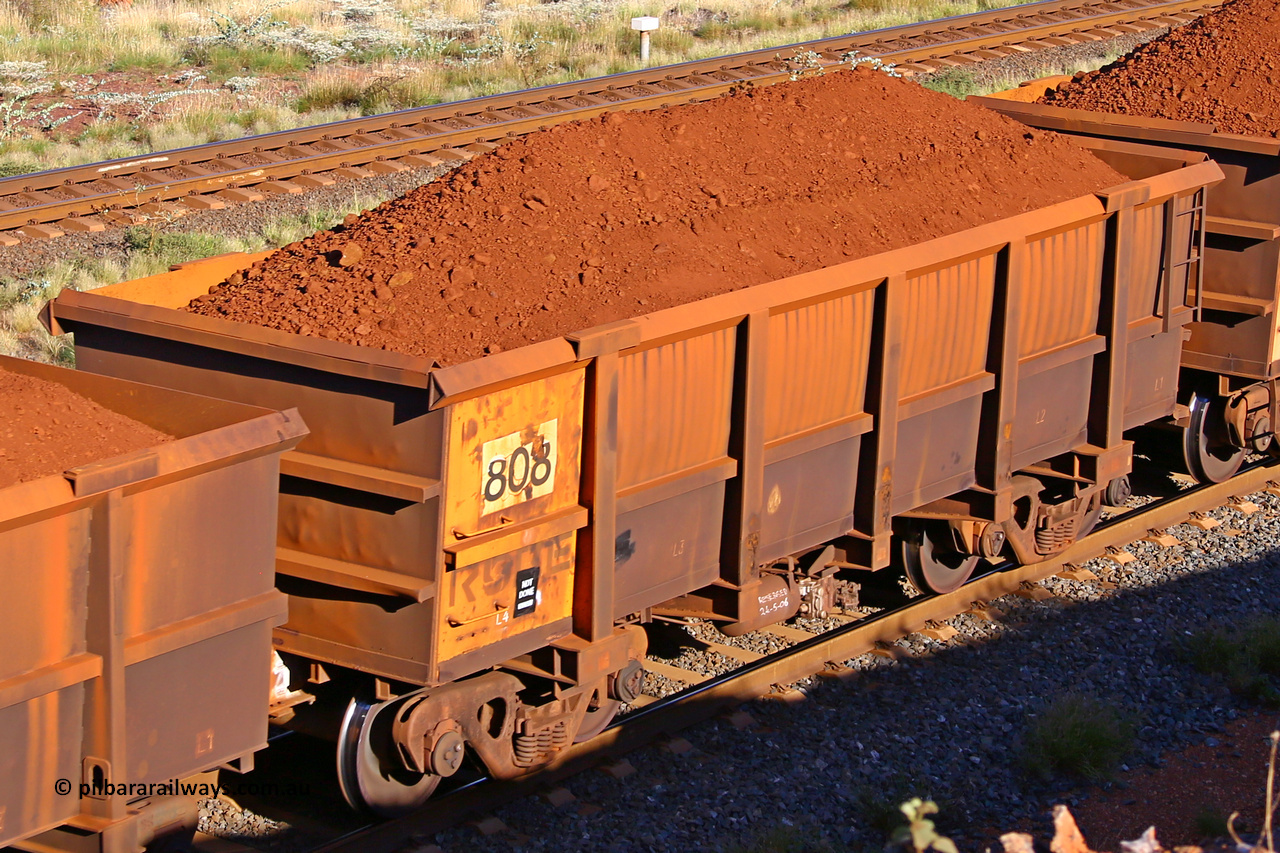 0808 210322 9707
Robe River ore waggon 808, built by Centurion Industries  WA, rotary coupler end non-handbrake side loaded view at the 17 km on the Cape Lambert line, March 22, 2021.
Keywords: 808;Centurion-Industries-WA;Robe-ore-waggon;