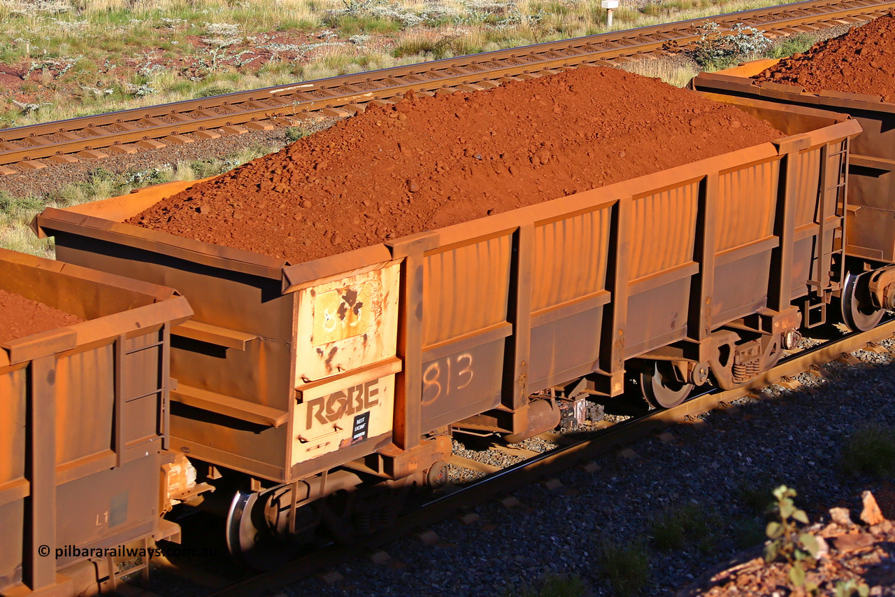 0813 210322 9758
Robe River ore waggon 813, built by Centurion Industries  WA, rotary coupler end non-handbrake side loaded view at the 17 km on the Cape Lambert line, March 22, 2021.
Keywords: 813;Centurion-Industries-WA;Robe-ore-waggon;