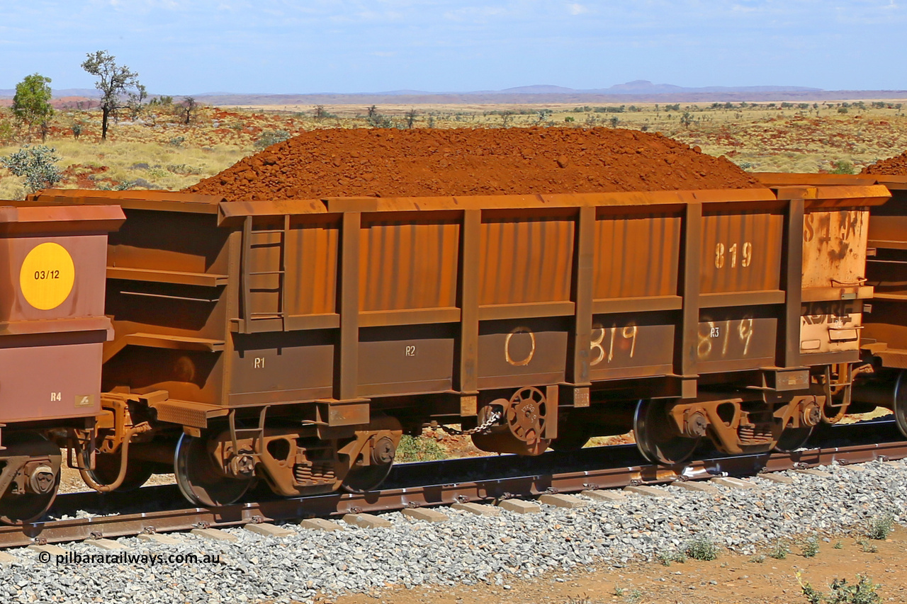 0819 170729 0213
Robe River ore waggon 819, built by Centurion Industries WA, fixed coupler handbrake side loaded view at the 103 km, between Maitland Siding and the Fortescue River on the Deepdale line. July 29, 2017.
Keywords: 819;Centurion-Industries-WA;Robe-ore-waggon;