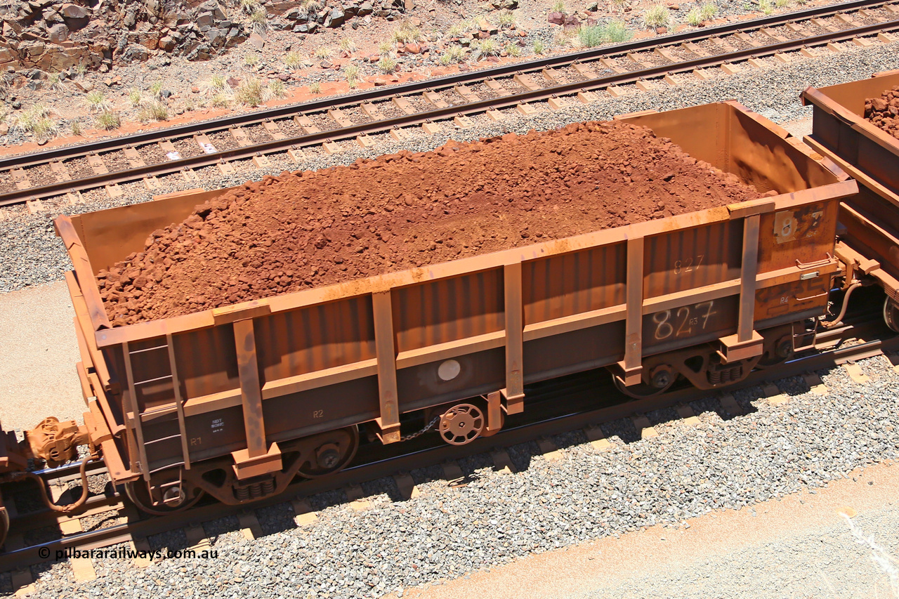 0827 160306 1479
Robe River ore waggon 827, built by Centurion Industries WA, fixed coupler handbrake side loaded view, at the 45 km, Harding Siding on the Cape Lambert line. March 6, 2016.
Keywords: 827;Centurion-Industries-WA;Robe-ore-waggon;