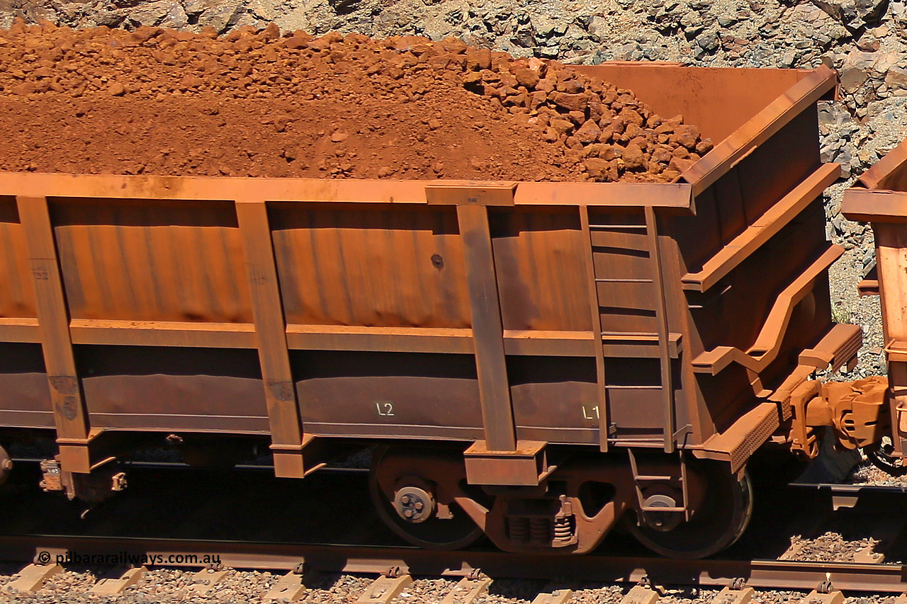 0832 160306 1603
Robe River ore waggon 832, built by Centurion Industries WA, fixed coupler non-handbrake side loaded view showing drop rib detail, at the 45 km, Harding Siding on the Cape Lambert line. March 6, 2016.
Keywords: 832;Centurion-Industries-WA;Robe-ore-waggon;