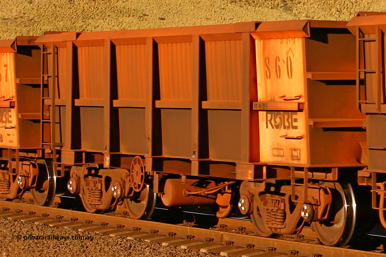 0860 060722 7636
Robe River ore waggon 860, built by Centurion Industries WA, rotary coupler end handbrake side empty view, at the 11.7 km, Cape Lambert. July 22, 2006.
Keywords: 860;Centurion-Industries-WA;Robe-ore-waggon;