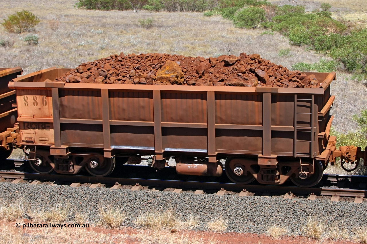 0886 081209 0151
Robe River ore waggon 886, built by Centurion Industries WA, non-handbrake side loaded view at the 7 km location just south of Cape Lambert yard. December 9, 2008.
Keywords: 886;Centurion-Industries-WA;Robe-ore-waggon;