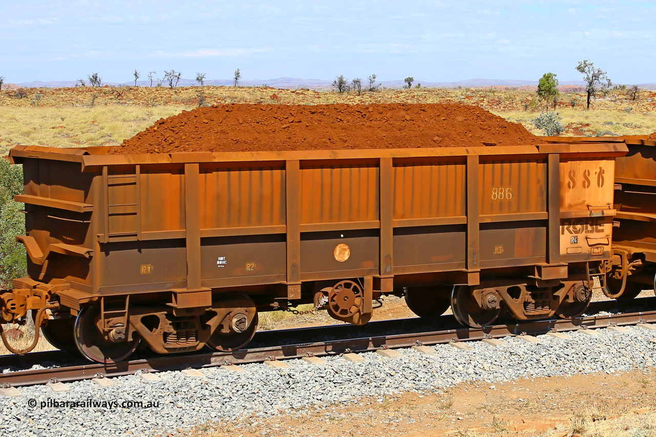 0886 170729 0219
Robe River ore waggon 886, built by Centurion Industries WA, fixed coupler handbrake side loaded view at the 103 km, between Maitland Siding and the Fortescue River on the Deepdale line. July 29, 2017.
Keywords: 886;Centurion-Industries-WA;Robe-ore-waggon;
