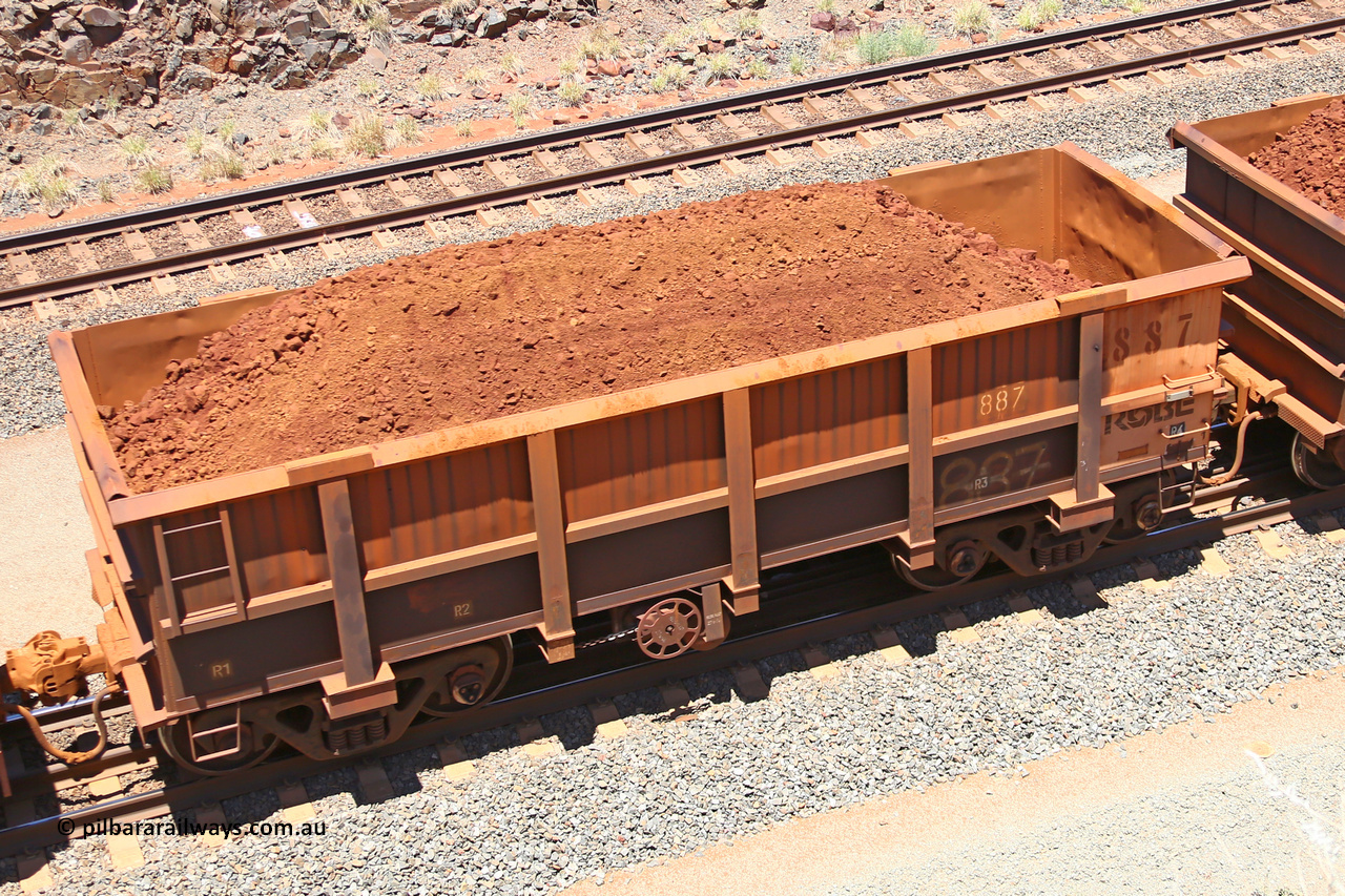 0887 160306 1466
Robe River ore waggon 887, built by Centurion Industries WA, fixed coupler handbrake side loaded view, at the 45 km, Harding Siding on the Cape Lambert line. March 6, 2016.
Keywords: 887;Centurion-Industries-WA;Robe-ore-waggon;