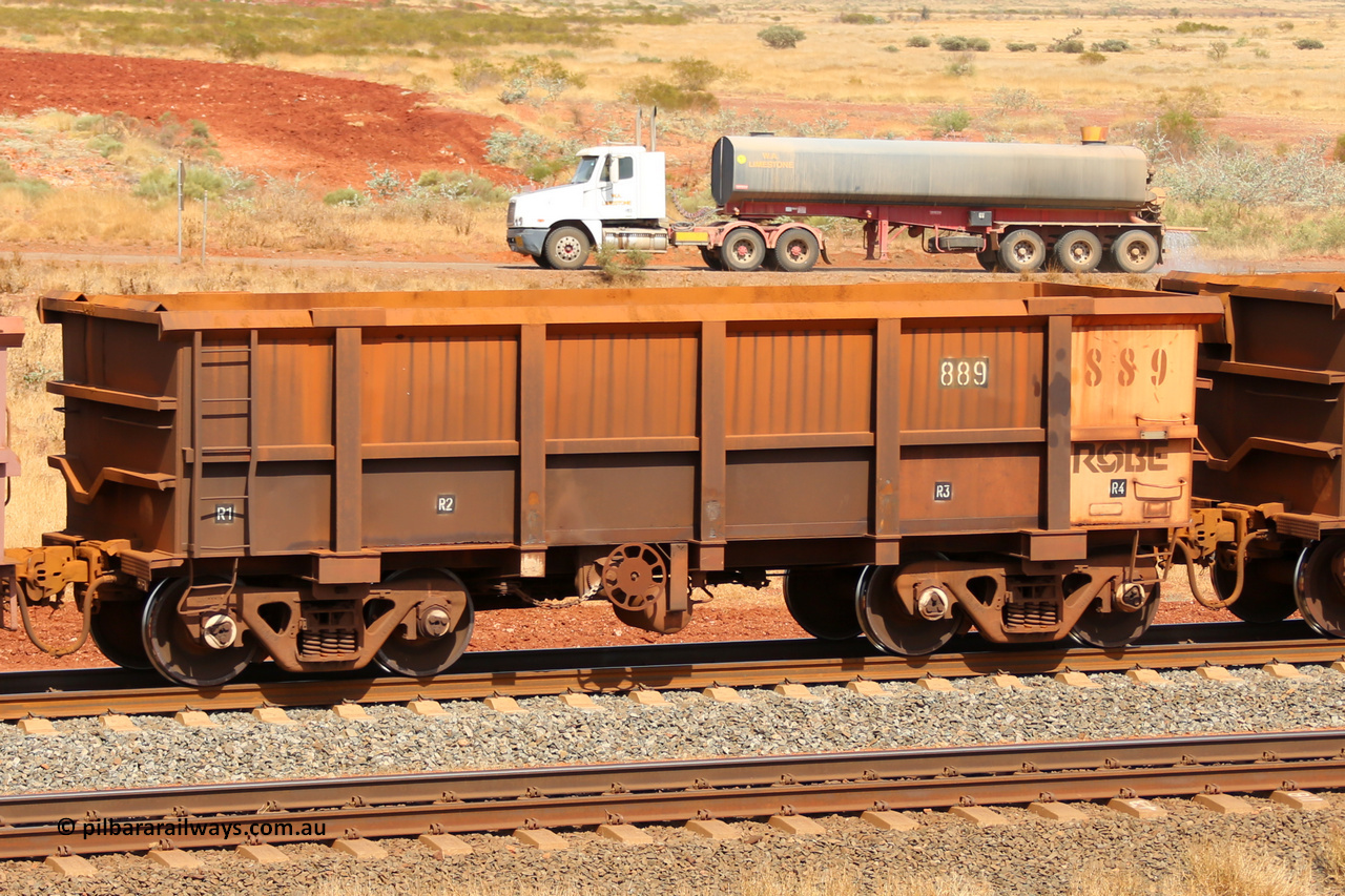 0889 141124 6819
Robe River ore waggon 889, built by Centurion Industries WA, fixed coupler handbrake side empty view at the 25 km at Arches Siding on the Cape Lambert line. November 24, 2014.
Keywords: 889;Centurion-Industries-WA;Robe-ore-waggon;