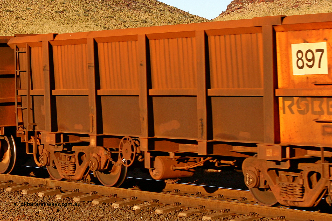 0897 060722 7588
Robe River ore waggon 897, built by Centurion Industries WA, rotary coupler end handbrake side empty partial view, at the 11.7 km, Cape Lambert. July 22, 2006.
Keywords: 897;Centurion-Industries-WA;Robe-ore-waggon;