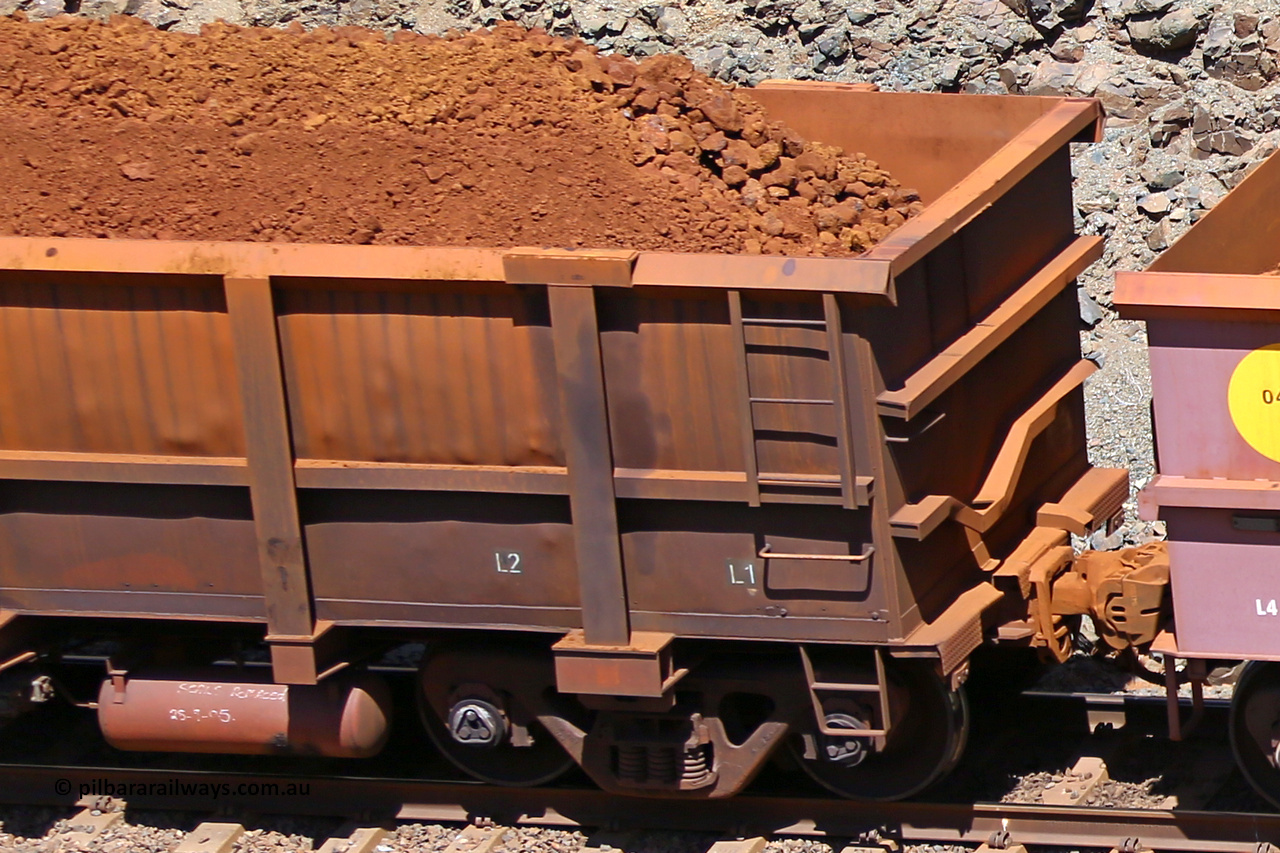 0897 160306 1587
Robe River ore waggon 897, built by Centurion Industries WA, fixed coupler non-handbrake side loaded partial view, shows drop rib detail, at the 45 km, Harding Siding on the Cape Lambert line. March 6, 2016.
Keywords: 897;Centurion-Industries-WA;Robe-ore-waggon;
