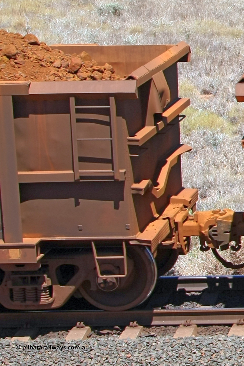 0901 081209 0167
Robe River ore waggon 901, built by Centurion Industries WA, fixed coupler end view showing drop rib detail, at the 7 km location just south of Cape Lambert yard. December 9, 2008.
Keywords: 901;Centurion-Industries-WA;Robe-ore-waggon;