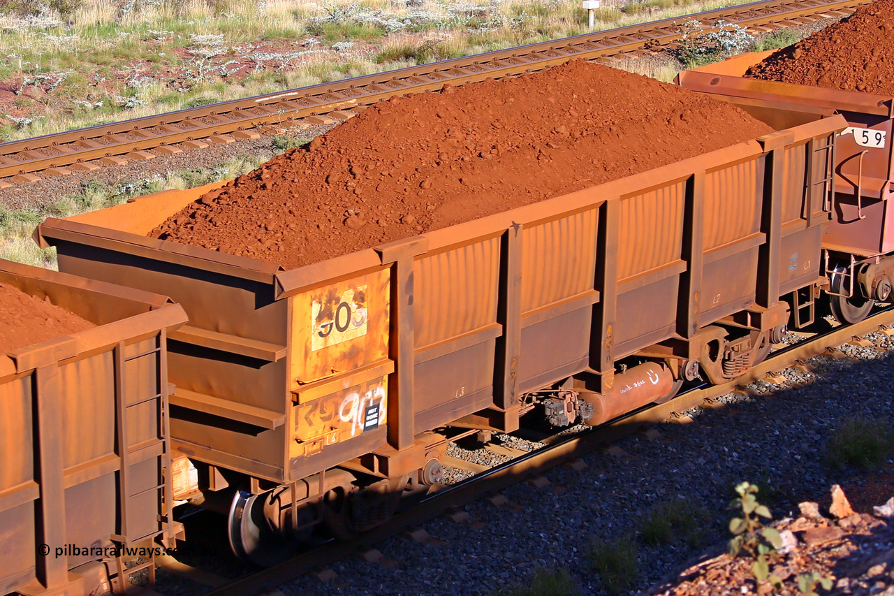 0903 210322 9684
Robe River ore waggon 903, built by Centurion Industries  WA, rotary coupler end non-handbrake side loaded view at the 17 km on the Cape Lambert line, March 22, 2021.
Keywords: 903;Centurion-Industries-WA;Robe-ore-waggon;