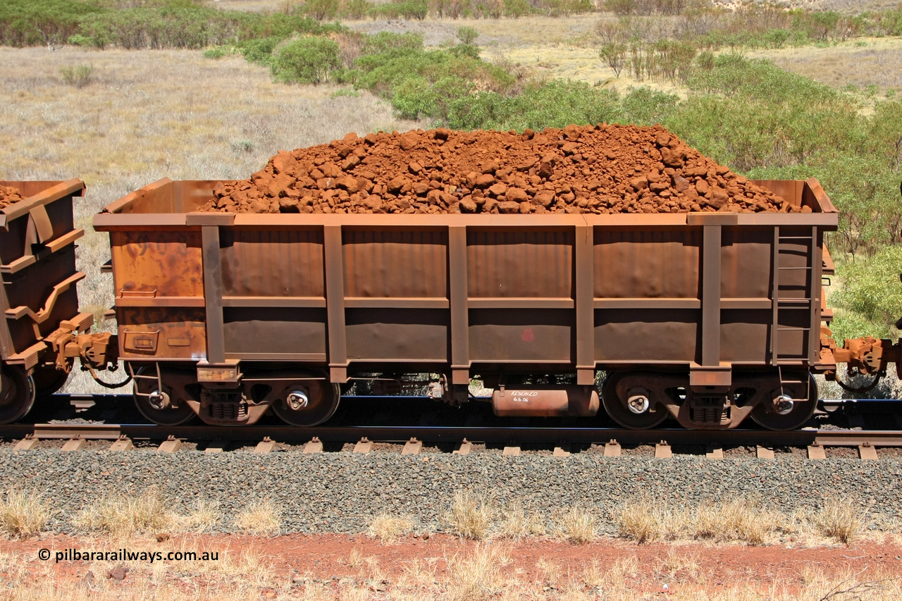 0908 081209 0140
Robe River ore waggon 908, built by Centurion Industries WA, non-handbrake side loaded view at the 7 km location just south of Cape Lambert yard. December 9, 2008.
Keywords: 908;Centurion-Industries-WA;Robe-ore-waggon;
