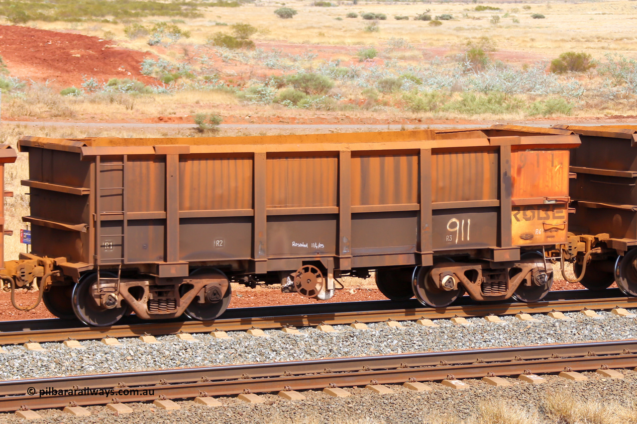 0911 141124 6785
Robe River ore waggon 911, built by Nippon Sharyo Nihon, Japan, fixed coupler handbrake side empty view, note modified underfloor arrangement, at the 25 km at Arches Siding on the Cape Lambert line. November 24, 2014.
Keywords: 911;Nippon-Sharyo-Nihon-Japan;Robe-ore-waggon;
