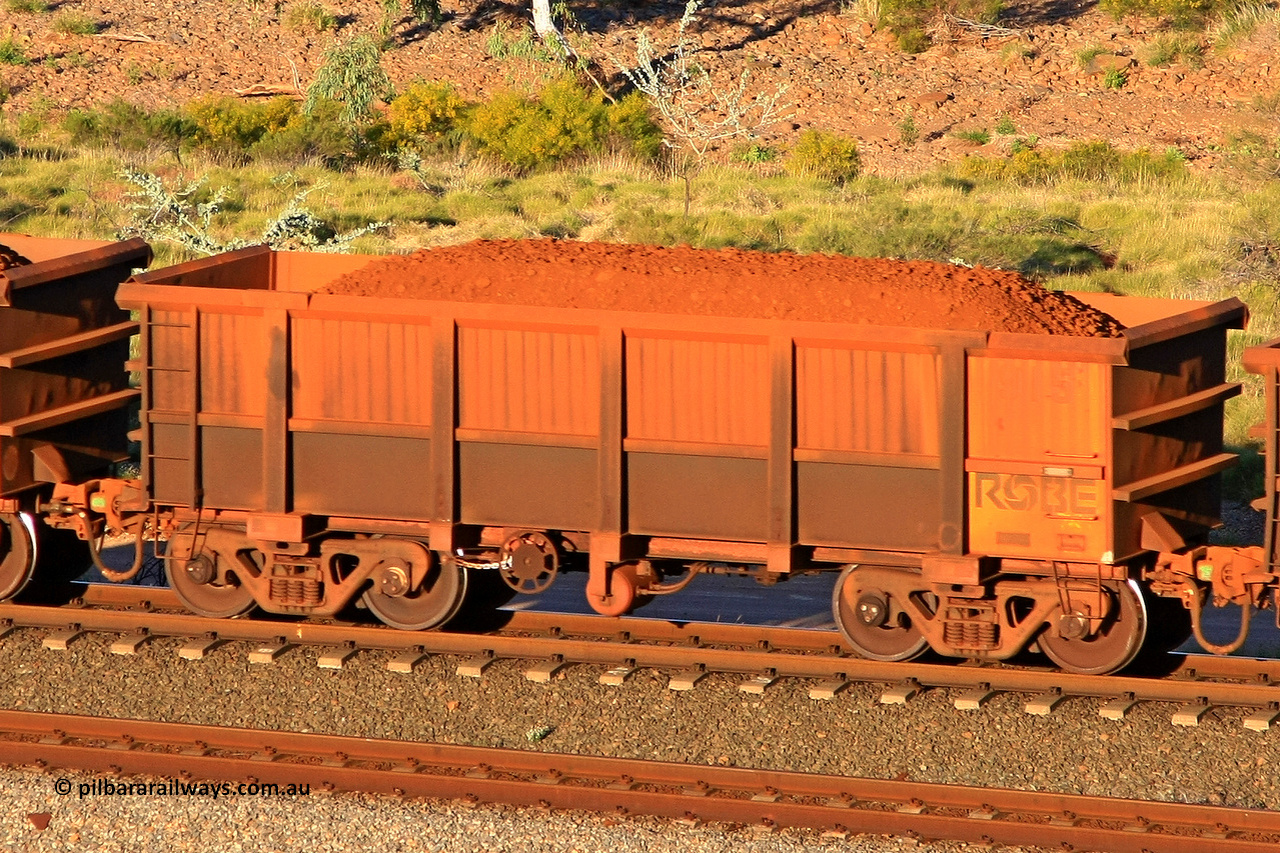 0915 110602 1711
Robe River ore waggon 915, built by Centurion Industries WA, rotary coupler end handbrake side loaded view at the 71 km, Western Creek on the Deepdale line. June 2, 2011.
Keywords: 915;Centurion-Industries-WA;Robe-ore-waggon;