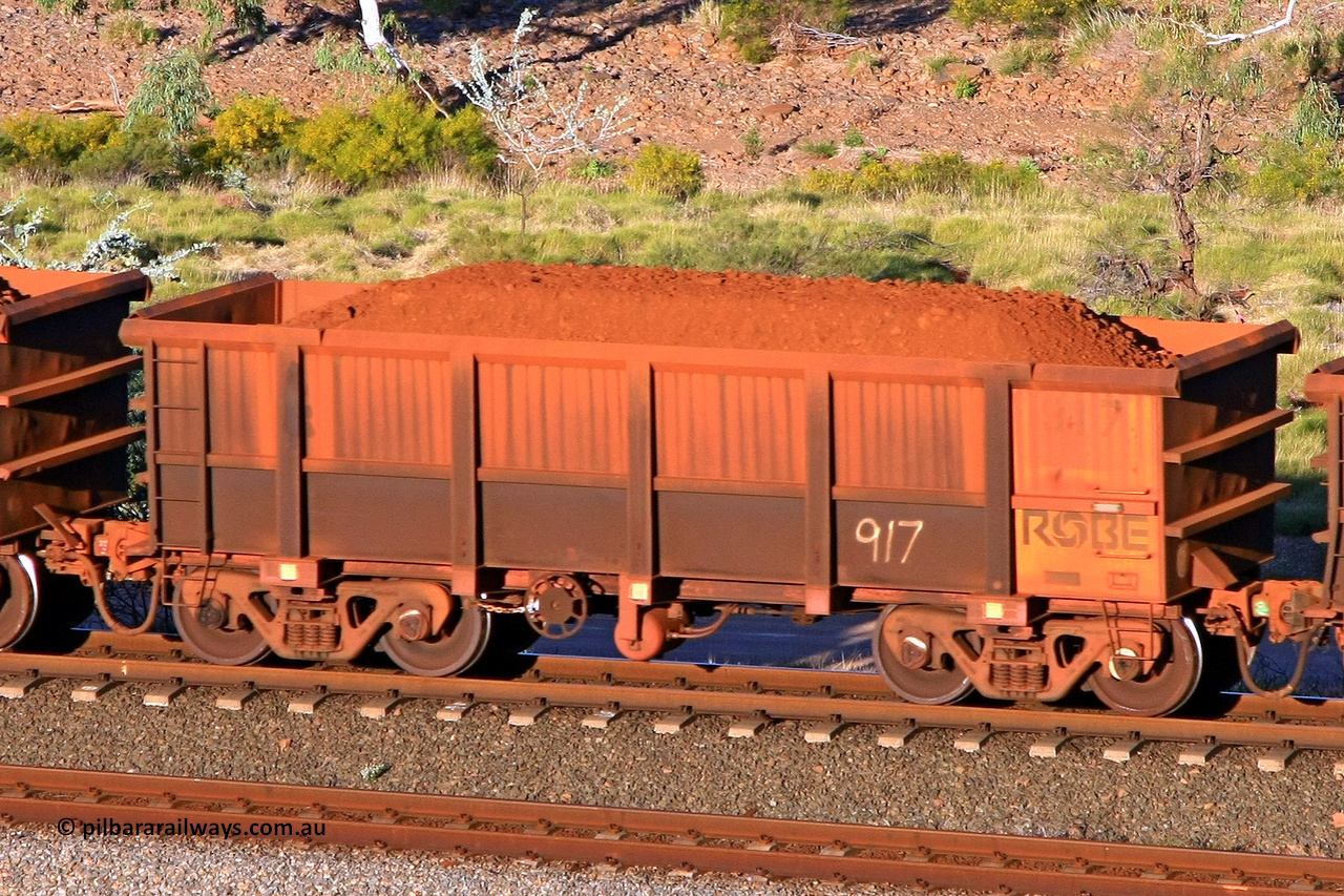 0917 110602 1685
Robe River ore waggon 917, built by Centurion Industries WA, rotary coupler end handbrake side loaded view at the 71 km, Western Creek on the Deepdale line. June 2, 2011.
Keywords: 917;Centurion-Industries-WA;Robe-ore-waggon;