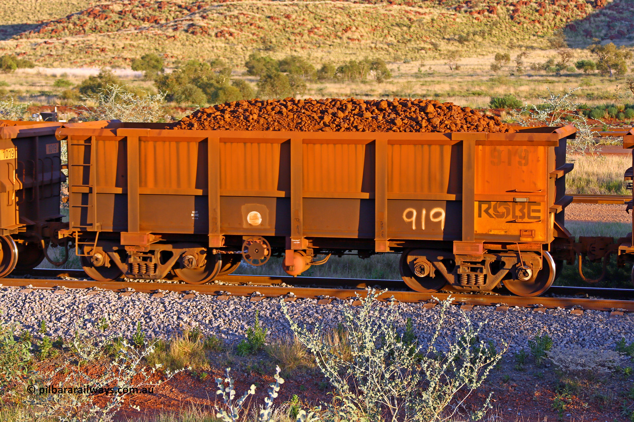 0919 170513 8684
Robe River ore waggon 919, built by Centurion Industries WA, rotary coupler end handbrake side loaded view, Cape Lambert yard, May 13, 2017.
Keywords: 919;Centurion-Industries-WA;Robe-ore-waggon;