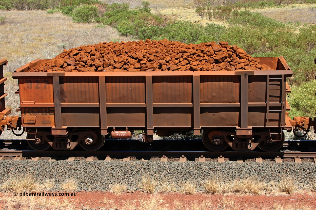 0927 081209 0130
Robe River ore waggon 927, built by Centurion Industries WA, non-handbrake side loaded view at the 7 km location just south of Cape Lambert yard. December 9, 2008.
Keywords: 927;Centurion-Industries-WA;Robe-ore-waggon;