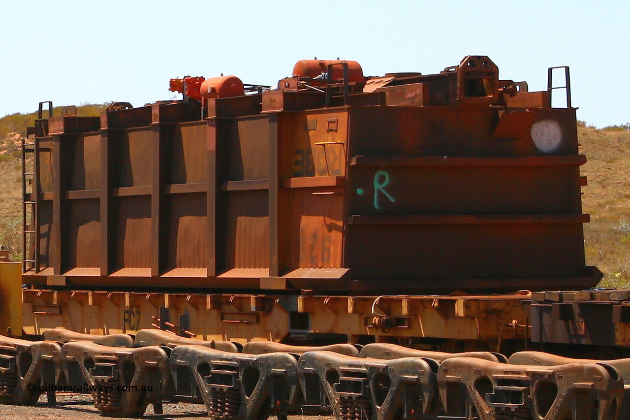 0928 070909 0667
Robe River ore waggon 928, built by Centurion Industries WA, rotary coupler end non-handbrake side upside down on flat waggon FC7, Cape Lambert. September 9, 2007.
Keywords: 928;Centurion-Industries-WA;Robe-ore-waggon;