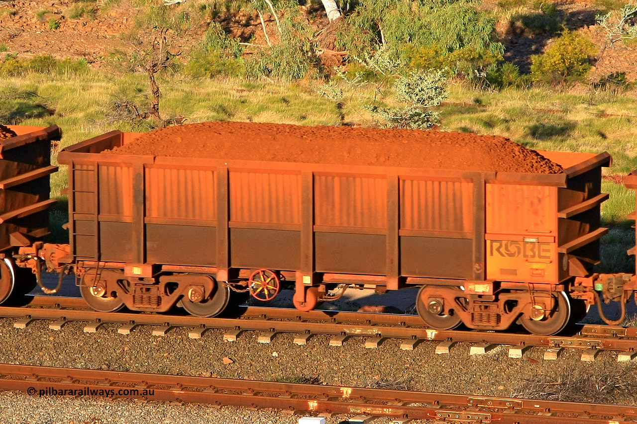 0936 110602 1616
Robe River ore waggon 936, built by Centurion Industries WA, rotary coupler end handbrake side loaded view at the 71 km, Western Creek on the Deepdale line. June 2, 2011.
Keywords: 936;Centurion-Industries-WA;Robe-ore-waggon;