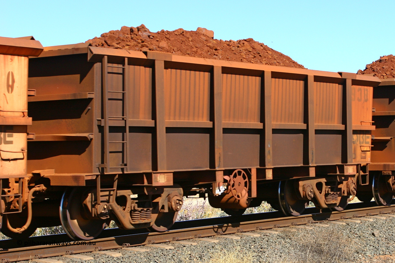 0938 060716 7186
Robe River ore waggon 938, built by Centurion Industries WA, fixed coupler end handbrake side loaded view at the 71 km on the Deepdale line, Western Creek, July 16, 2006.
Keywords: 938;Centurion-Industries-WA;Robe-ore-waggon;