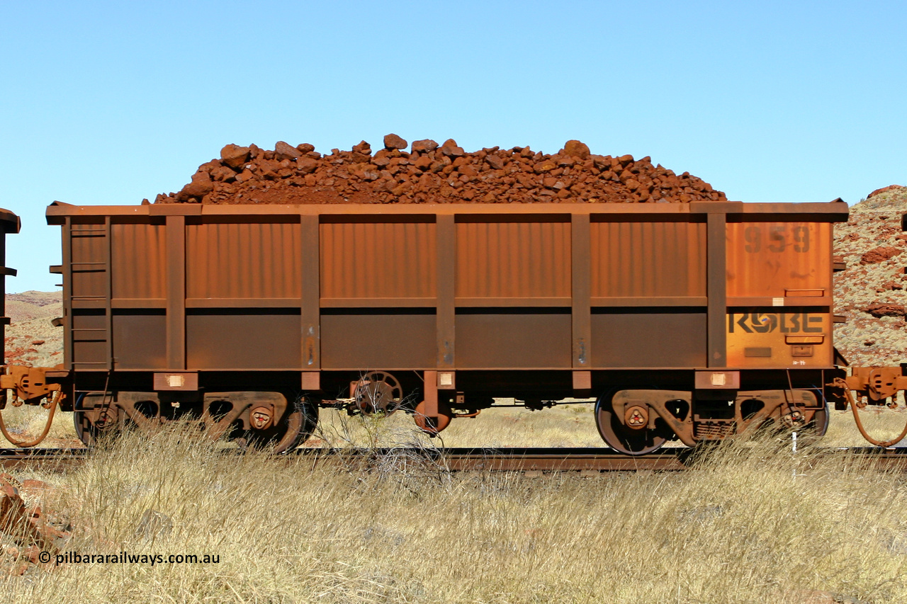 0959 060722 7526
Robe River ore waggon 959, built by Centurion Industries WA, handbrake side loaded view at the 78.8 km between Western Creek and Maitland on the Deepdale line. July 22, 2006.
Keywords: 959;Centurion-Industries-WA;Robe-ore-waggon;