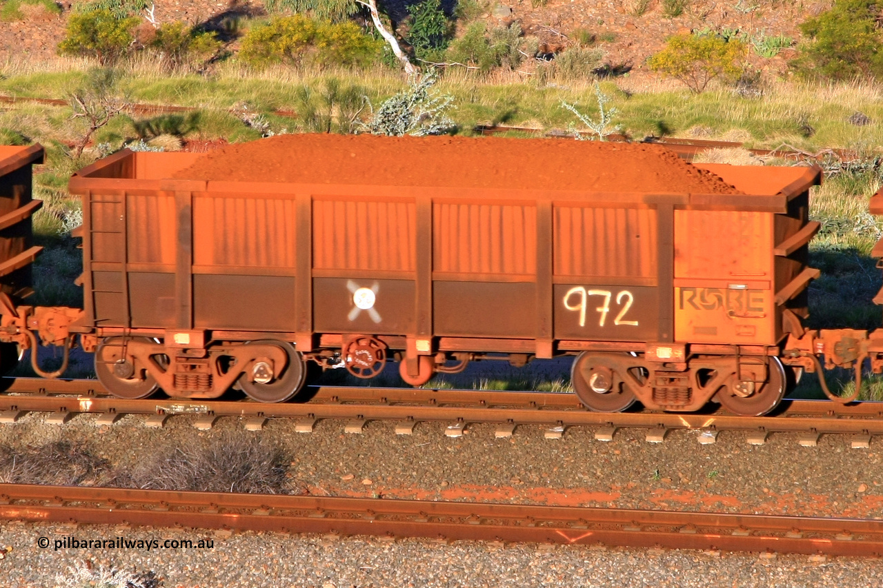 0972 110602 1659
Robe River ore waggon 972, built by Centurion Industries WA, rotary coupler end handbrake side loaded view at the 71 km, Western Creek on the Deepdale line. June 2, 2011.
Keywords: 972;Centurion-Industries-WA;Robe-ore-waggon;