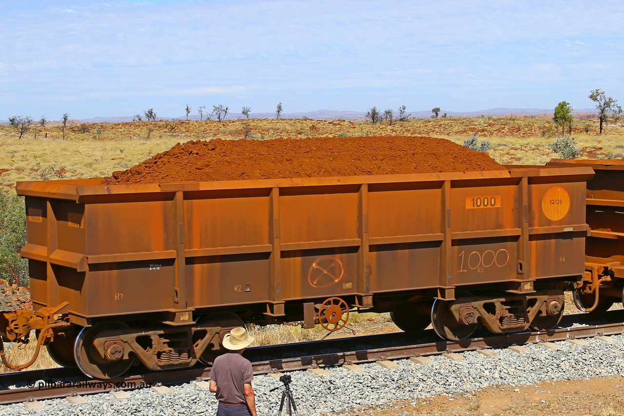 1000 170729 0271
Robe River ore waggon 1000, class leader built by Bradken Rail Qld in December 2005, fixed coupler handbrake side loaded view at the 103 km, between Maitland Siding and the Fortescue River on the Deepdale line. July 29, 2017.
Keywords: 1000;Bradken-Rail-Qld;Robe-ore-waggon;