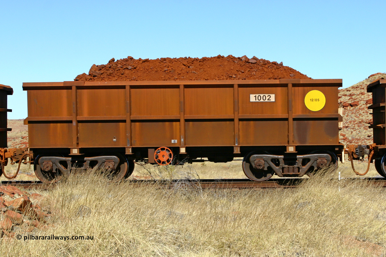 1002 060722 7487
Robe River ore waggon 1002, built by Bradken Rail Qld in December 2005, handbrake side loaded view at the 78.8 km between Western Creek and Maitland on the Deepdale line. July 22, 2006.
Keywords: 1002;Bradken-Rail-Qld;Robe-ore-waggon;