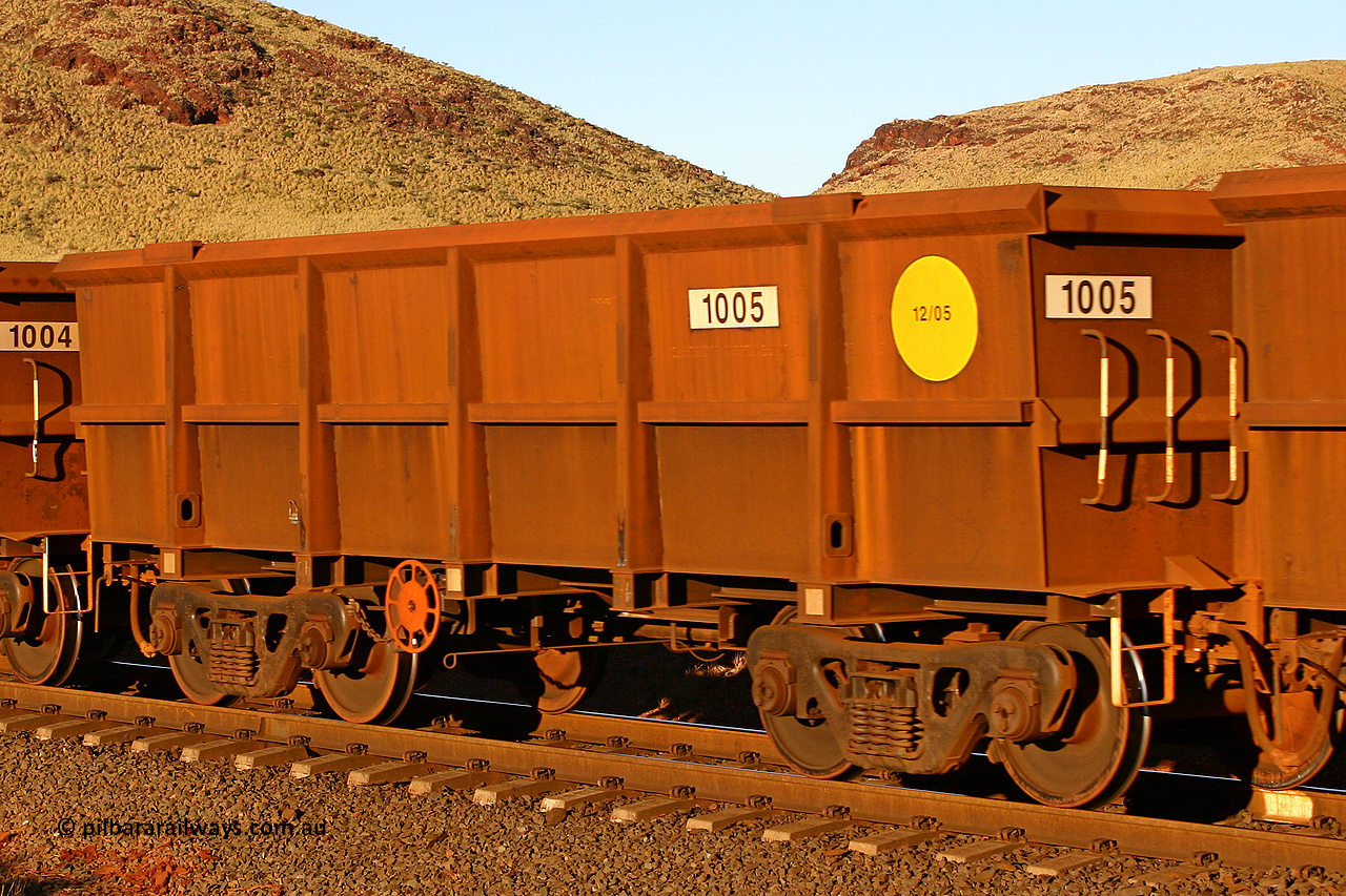 1005 060722 7602
Robe River ore waggon 1005, built by Bradken Rail Qld in December 2005, rotary coupler end handbrake side empty view, at the 11.7 km, Cape Lambert. July 22, 2006.
Keywords: 1005;Bradken-Rail-Qld;Robe-ore-waggon;