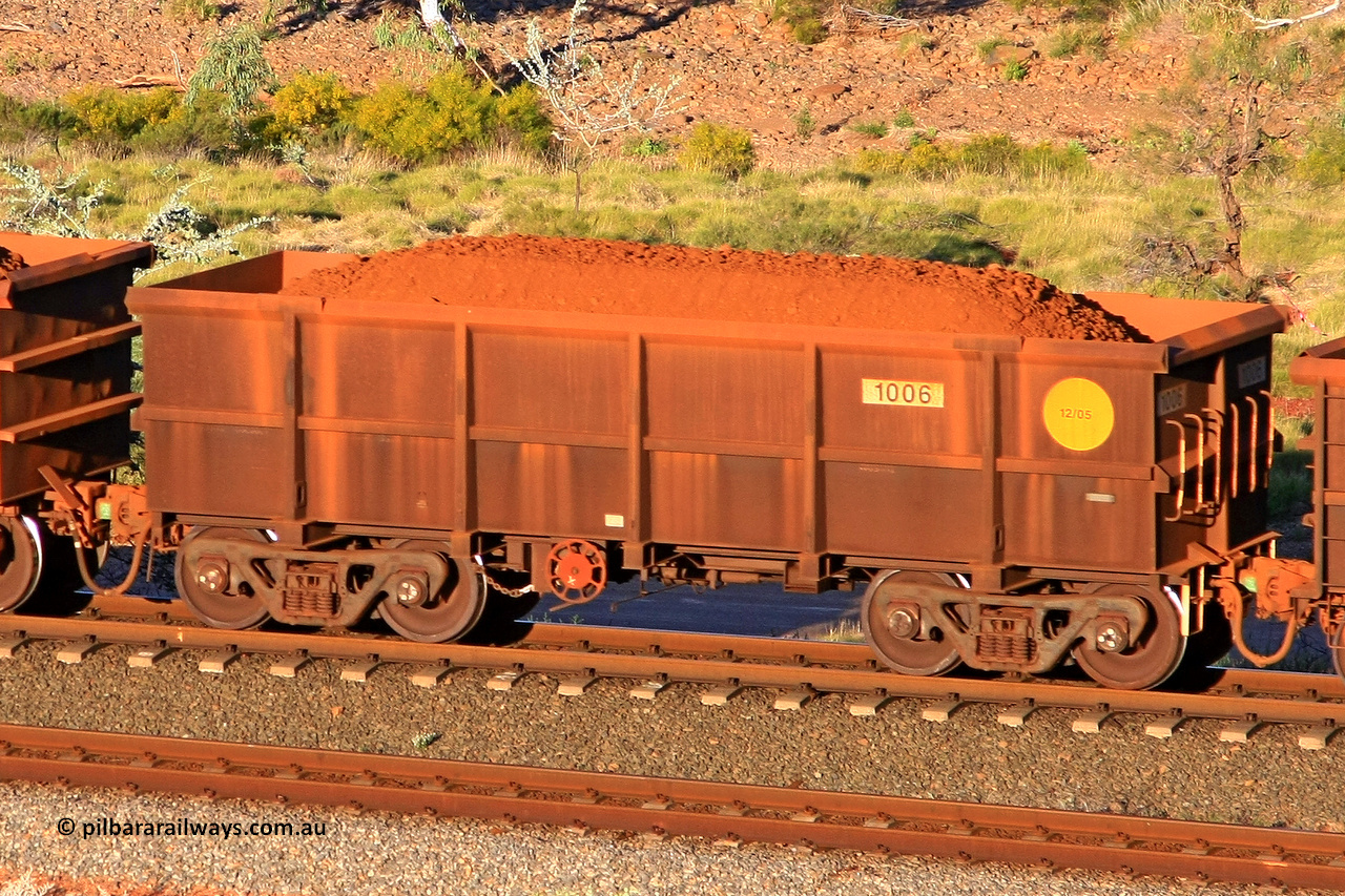 1006 110602 1699
Robe River ore waggon 1006, built by Bradken Rail Qld in December 2005, rotary coupler end handbrake side loaded view at the 71 km, Western Creek on the Deepdale line. June 2, 2011.
Keywords: 1006;Bradken-Rail-Qld;Robe-ore-waggon;