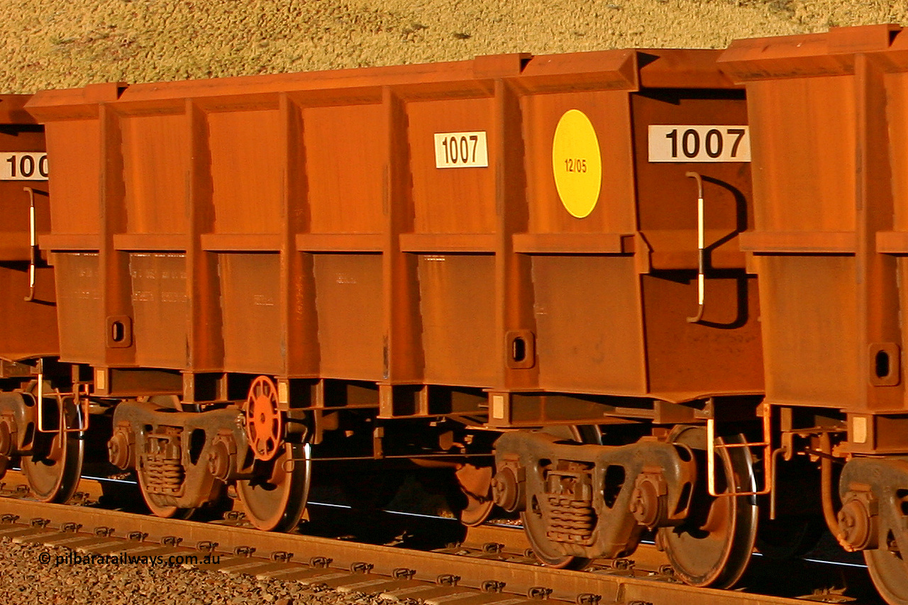 1007 060722 7598
Robe River ore waggon 1007, built by Bradken Rail Qld in December 2005, rotary coupler end handbrake side empty view, at the 11.7 km, Cape Lambert. July 22, 2006.
Keywords: 1007;Bradken-Rail-Qld;Robe-ore-waggon;