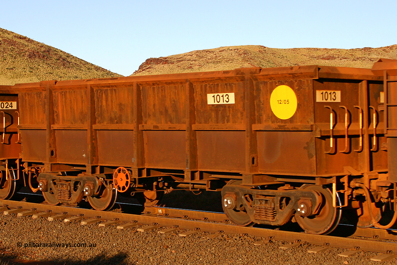 1013 060722 7627
Robe River ore waggon 1013, built by Bradken Rail Qld in December 2005, rotary coupler end handbrake side empty view, at the 11.7 km, Cape Lambert. July 22, 2006.
Keywords: 1013;Bradken-Rail-Qld;Robe-ore-waggon;