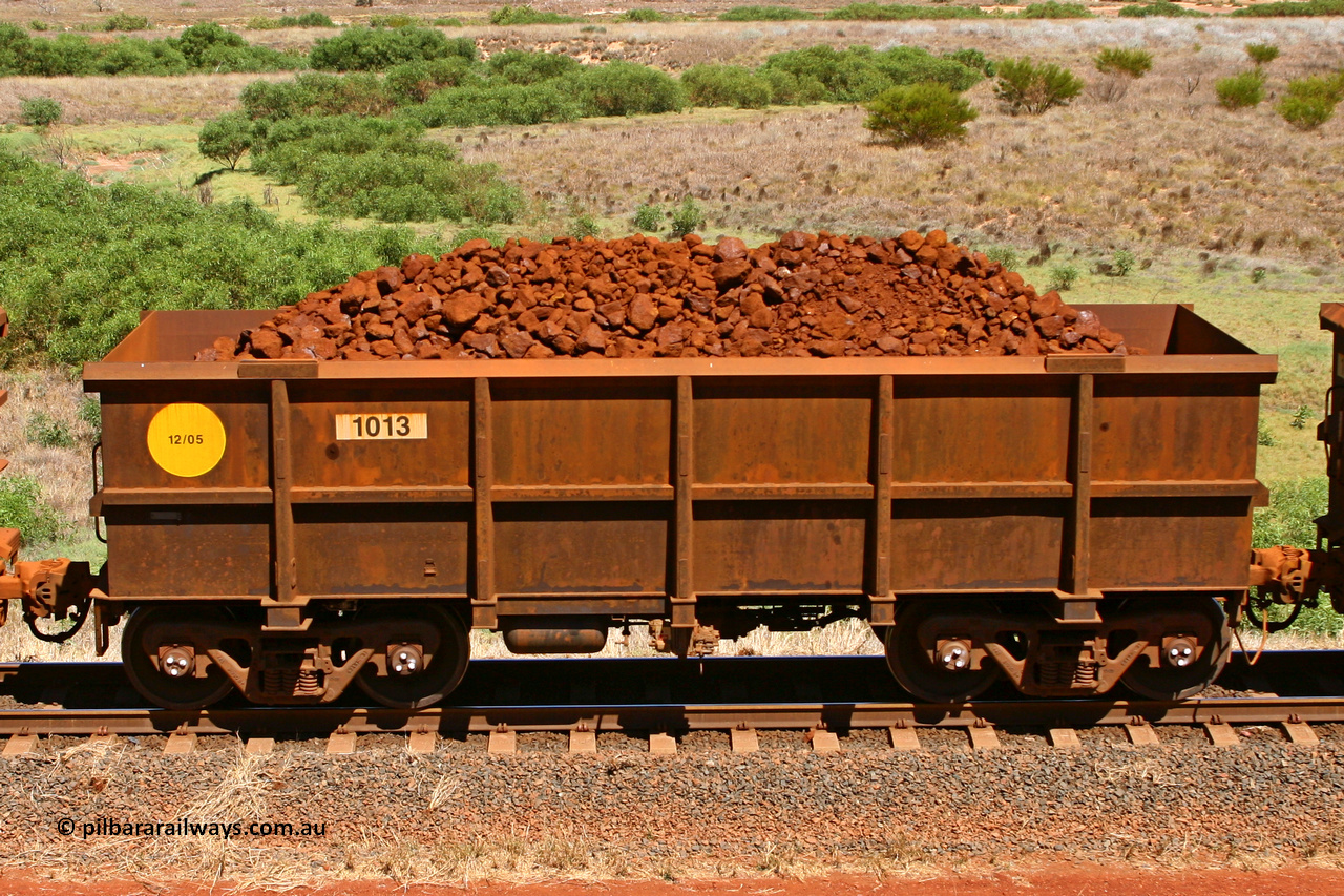 1013 061209 8192
Robe River ore waggon 1013, built by Bradken Rail Qld in December 2005, non-handbrake side loaded view at the 7 km location just south of Cape Lambert yard. December 9, 2006.
Keywords: 1013;Bradken-Rail-Qld;Robe-ore-waggon;