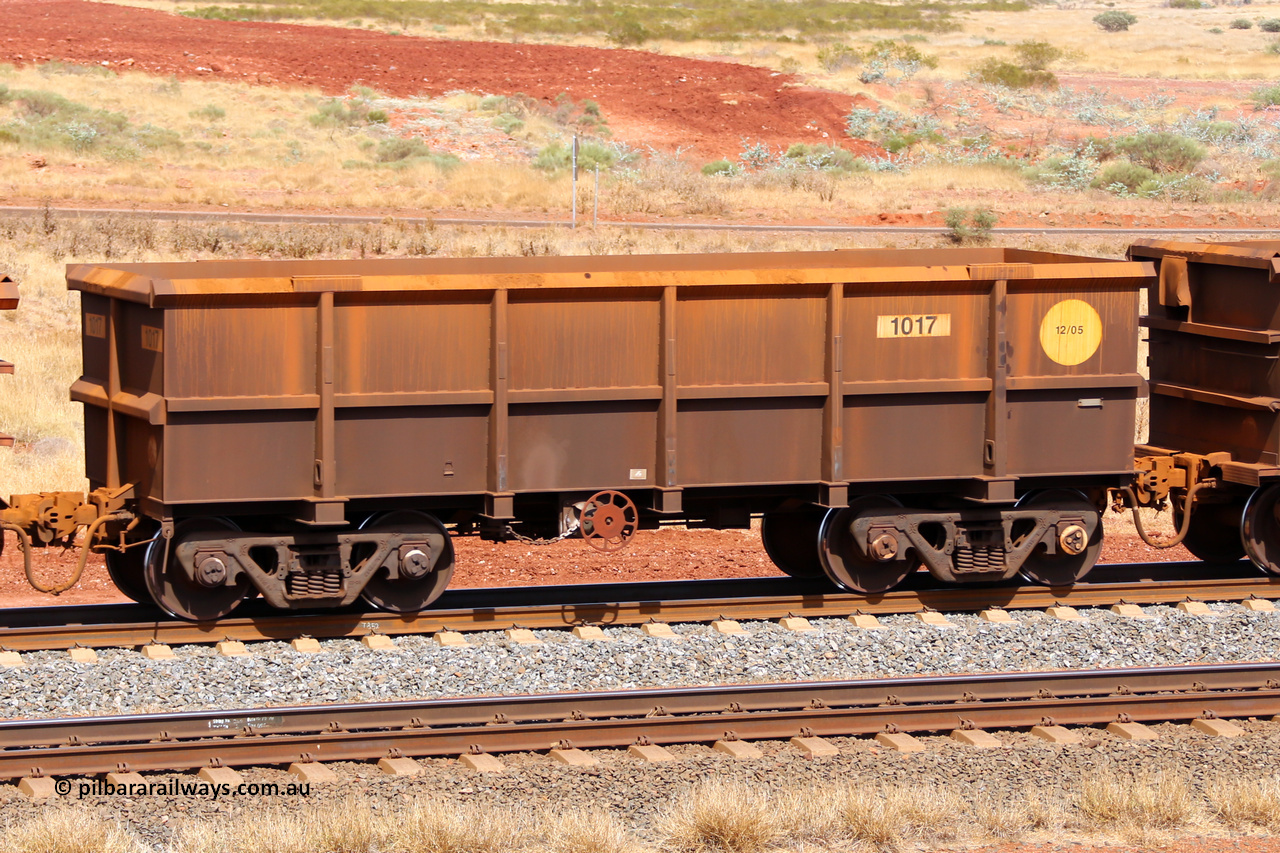 1017 141124 6858
Robe River ore waggon 1017, built by Bradken Rail Qld in December 2005, fixed coupler handbrake side empty view at the 25 km at Arches Siding on the Cape Lambert line. November 24, 2014.
Keywords: 1017;Bradken-Rail-Qld;Robe-ore-waggon;