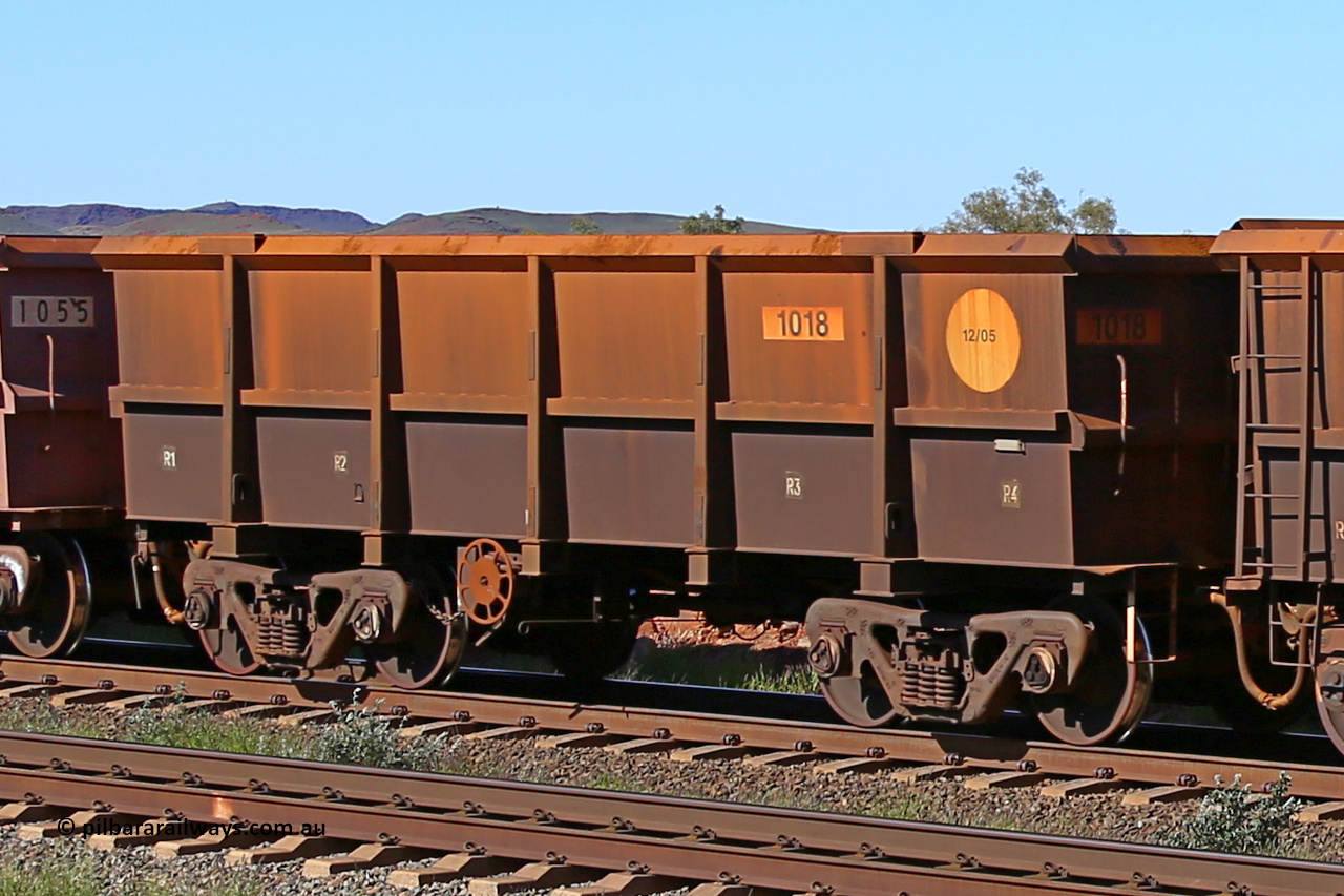 1018 160727 0977
Robe River ore waggon 1018, built by Bradken Rail Qld in December 2005, rotary coupler end handbrake side empty partial view at Harding Siding on the Cape Lambert line, July 27, 2016.
Keywords: 1018;Bradken-Rail-Qld;Robe-ore-waggon;
